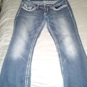 Vigoss darker blue jeans with white stitching